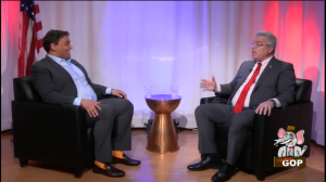 Men in suits talking.