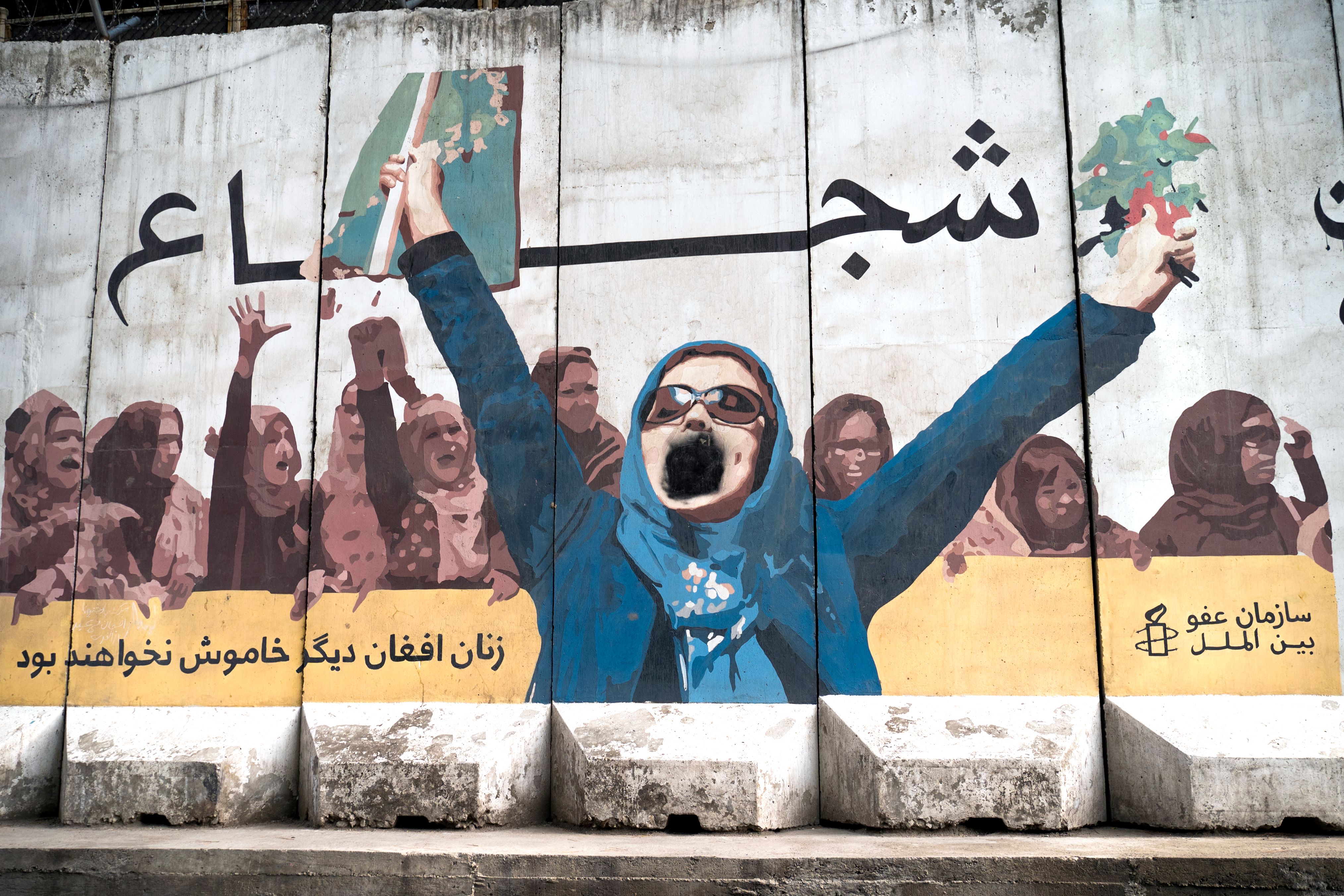 A mural of women with the words