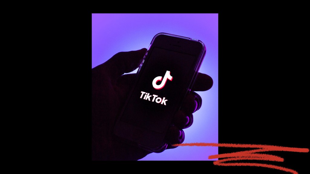 Hand holding phone