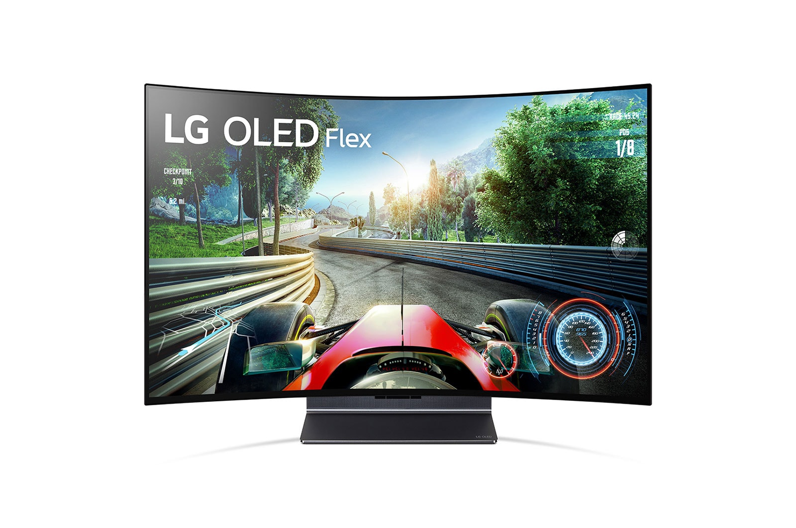 A mocked up screenshot of a fake racing game with an old 1960s style F1 car racing down a brightly lit mountain highway, projected on a curving TV screen with the legend LG OLED Flex on it.