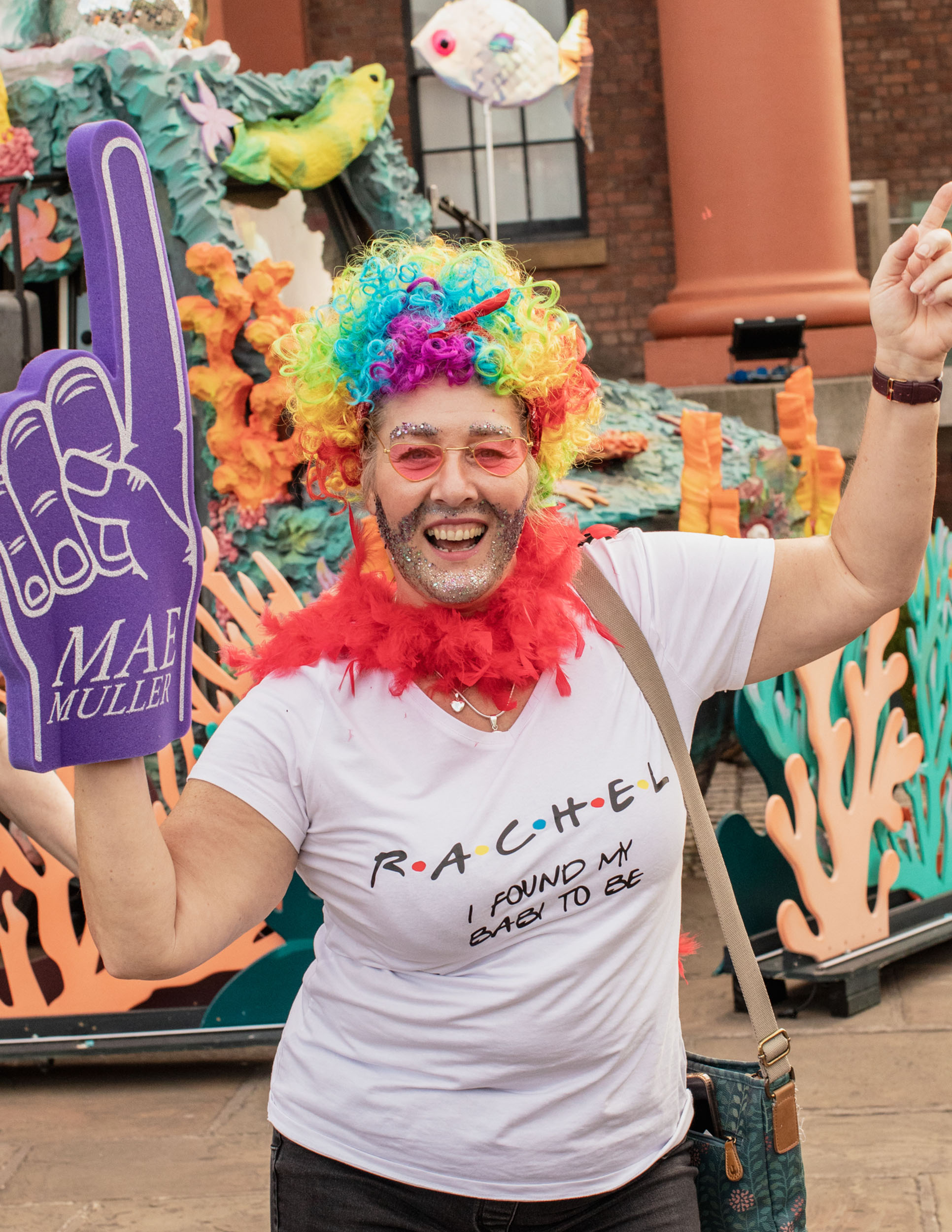 Eurovision 2023 in Liverpool: A Mae Muller supporter in a glitter beard and feather boa