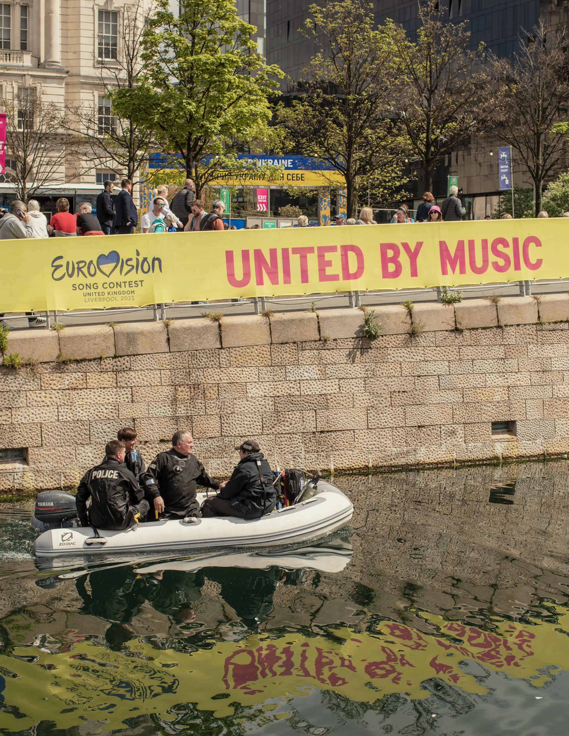 Eurovision 2023 in Liverpool: A police boat under a Eurovision sign