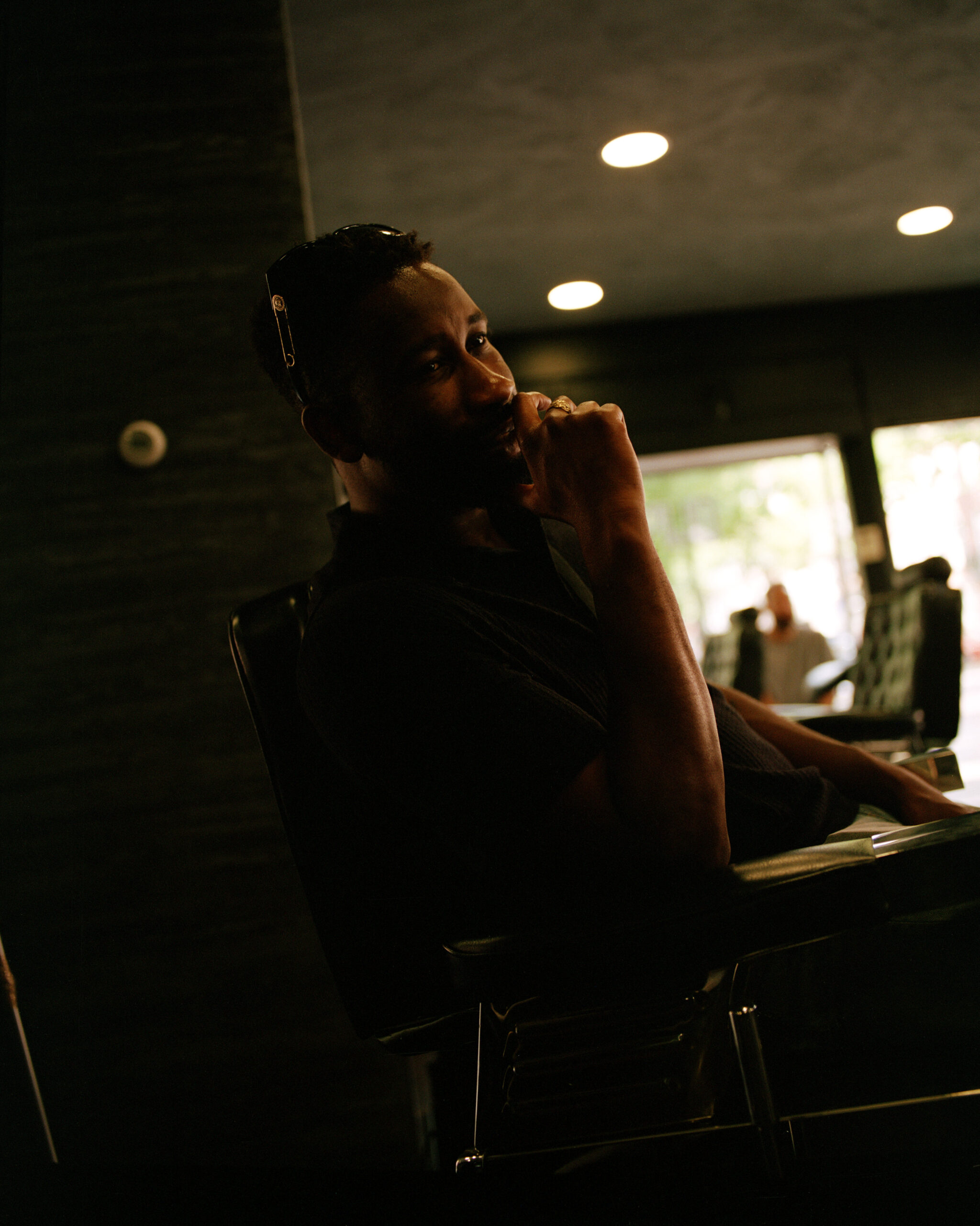 Delano, Amadi's manager