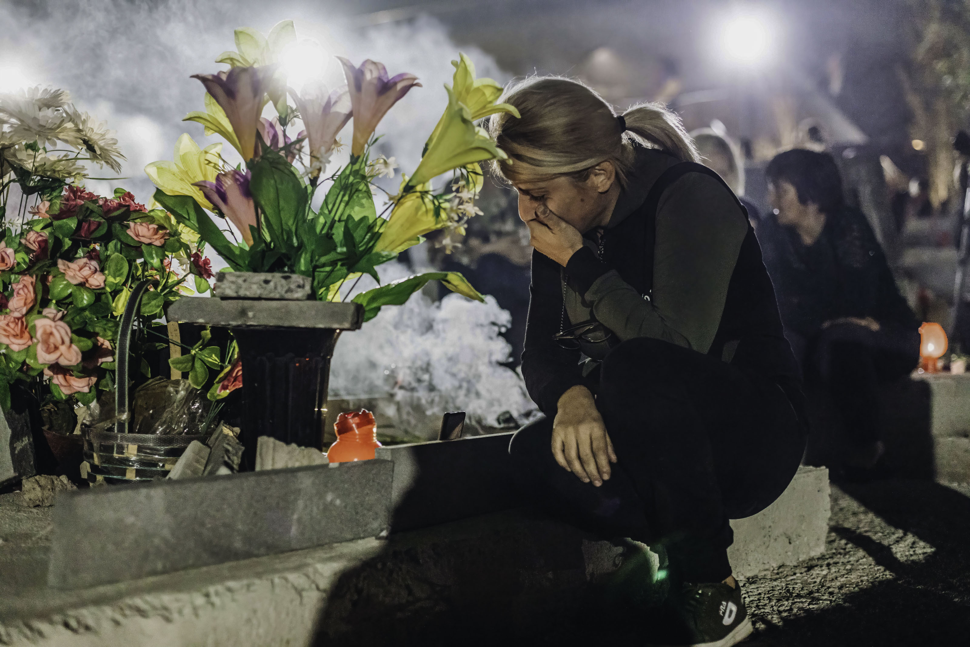 A woman mourns at the grave of a relative killed in the Nagorno-Karabakh war. Photo: Diego Herrera/SOPA Images/LightRocket via Getty Images