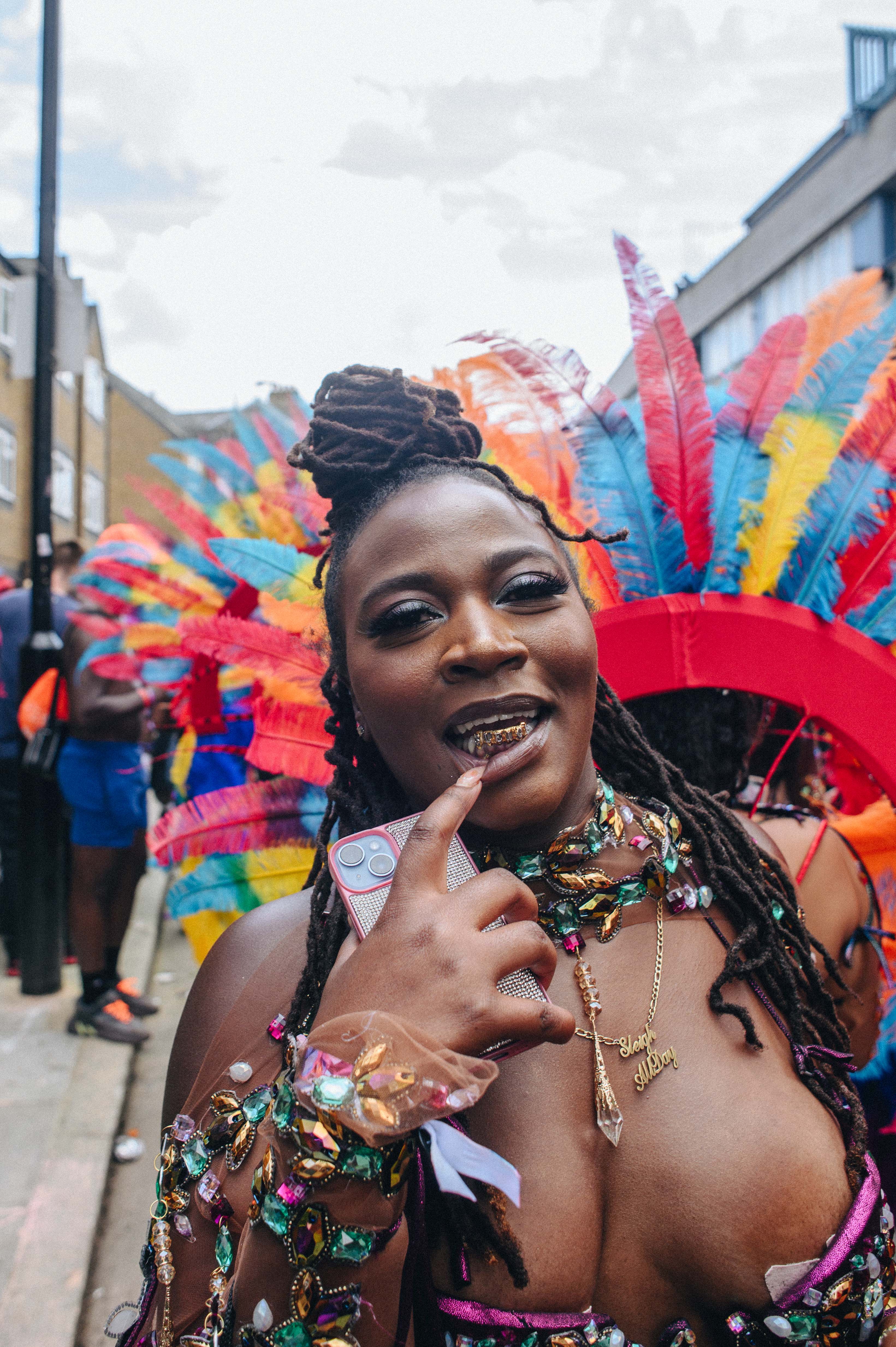 Notting Hill Carnival 2023, London: A dancer shows off her grill