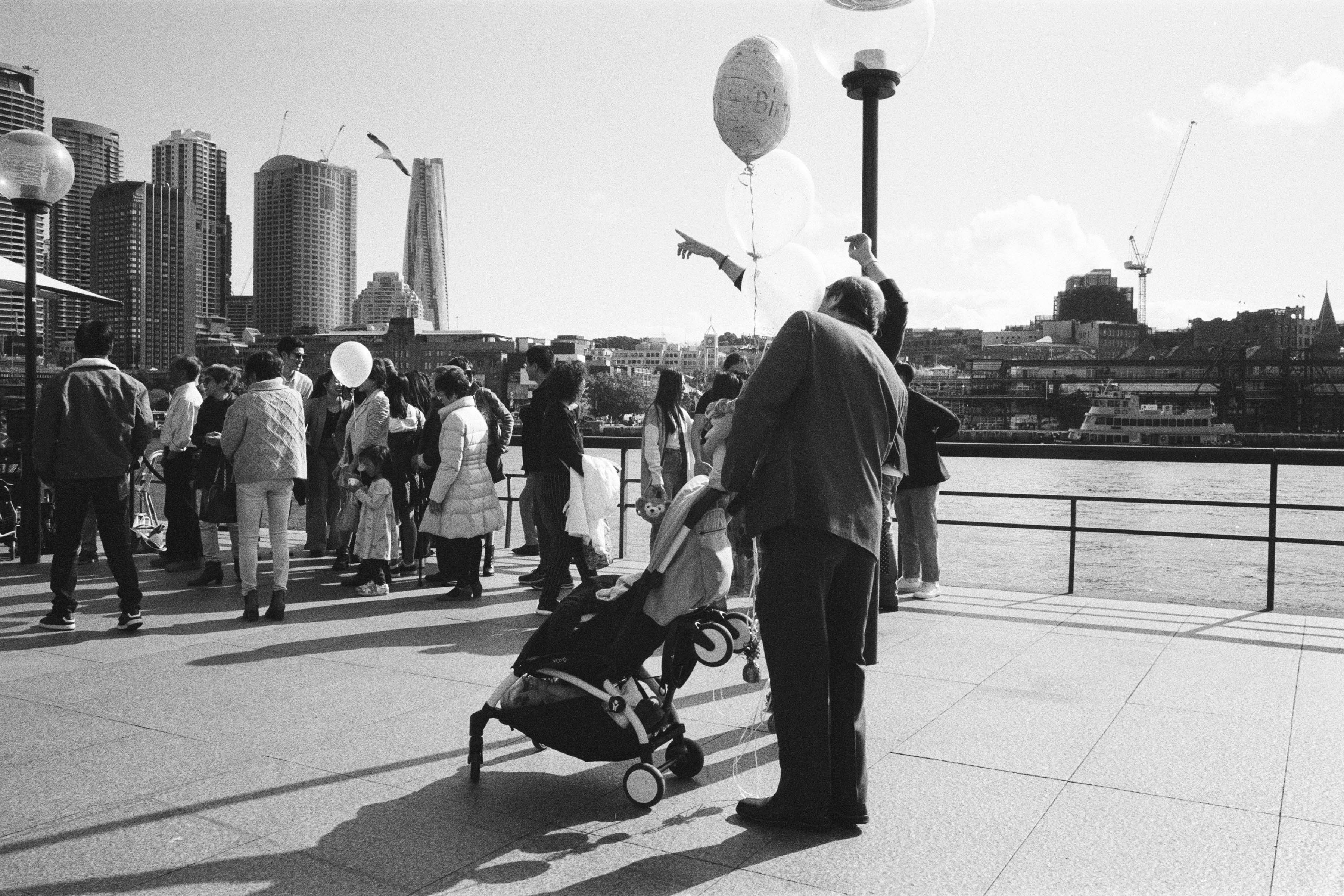 Man with a pram in Sydney city