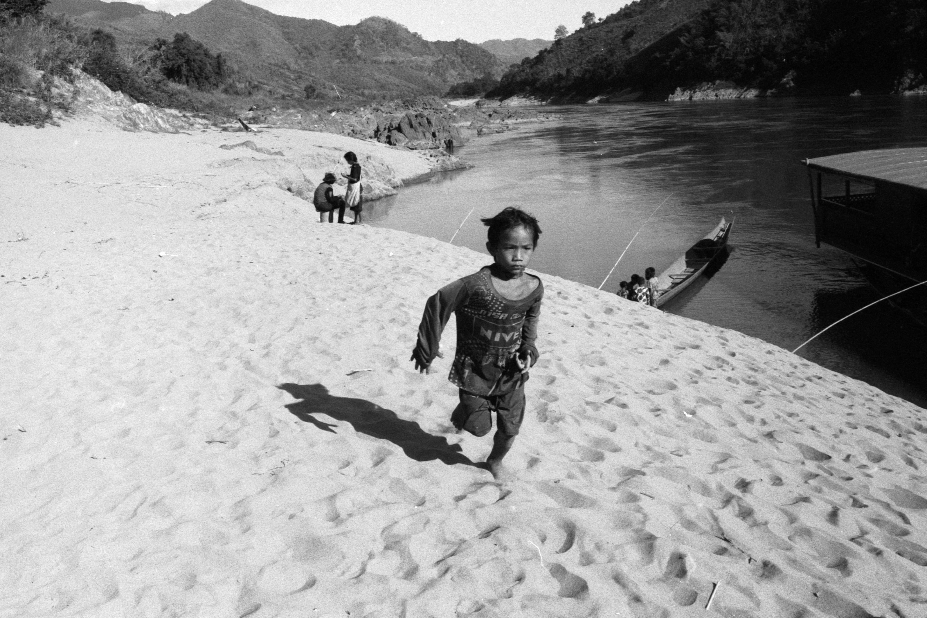 Kid running on sand