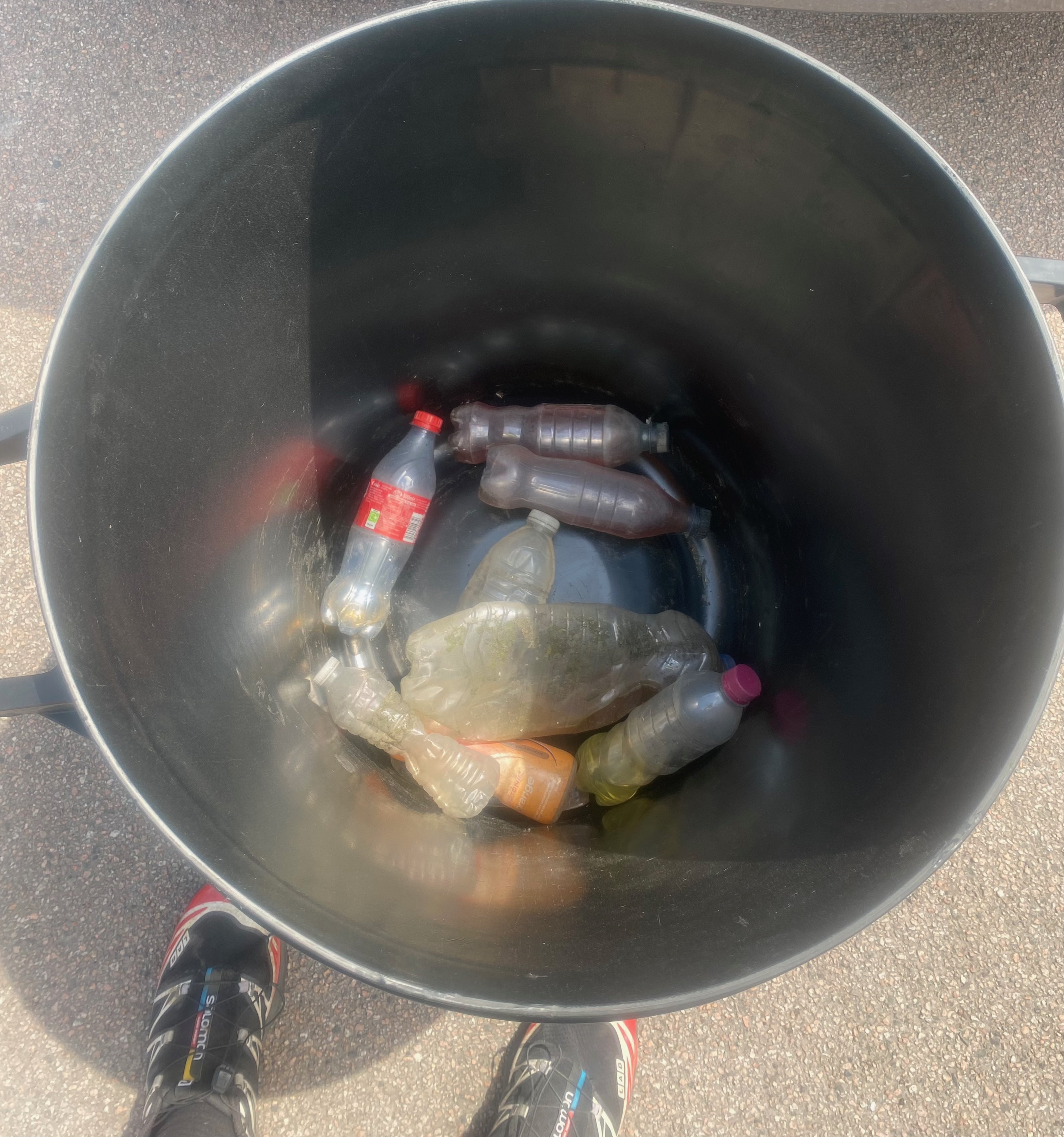 A bin full of bottles of urine.