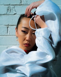 Elle Shimada stares into the camer