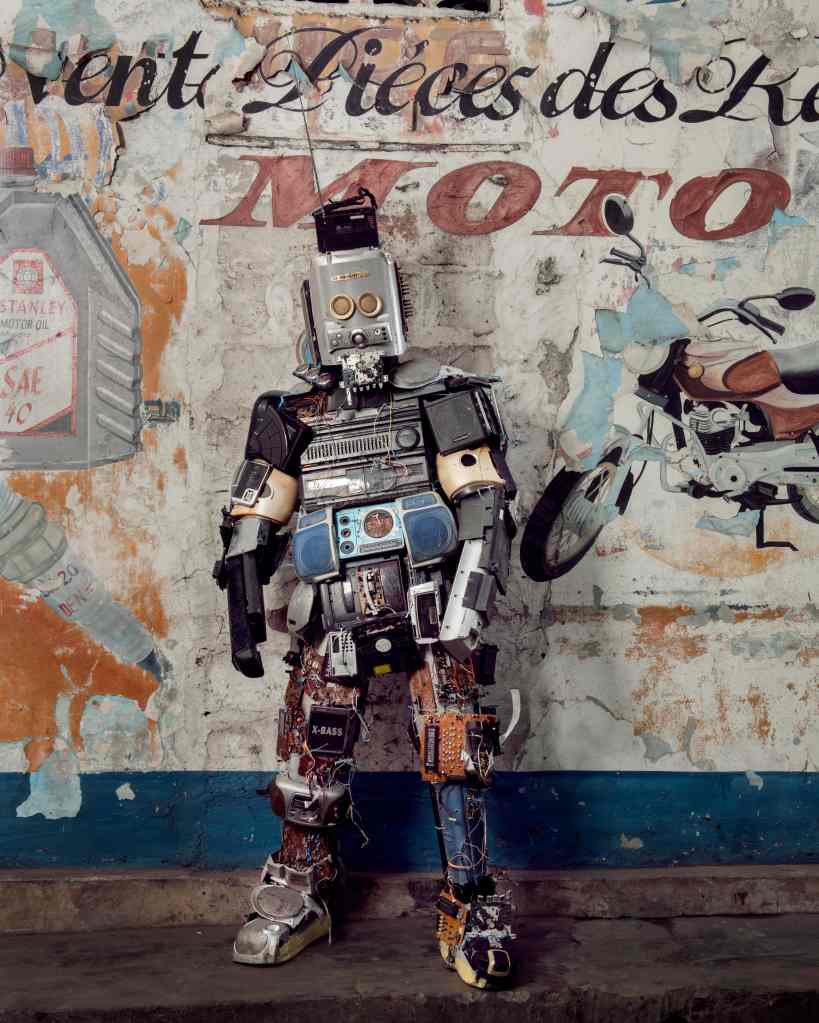 A person dressed in a costume made from radio devices