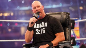 Stone Cold Steve Austin yelling into a microphone.