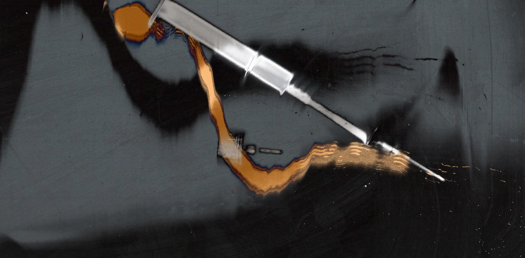 A syringe on blurred background